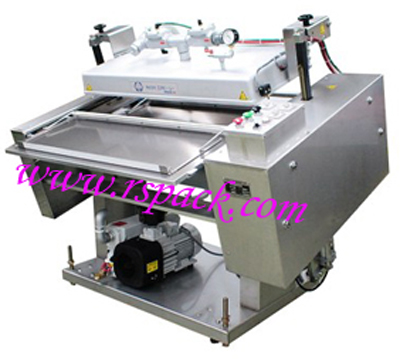 日本KZ210连续式真空包装机